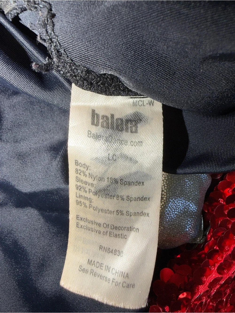 Balara Sequined Black Long-Sleeve Performance Leotard with Red Accents